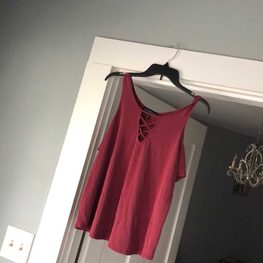 tank top, with sleeves.